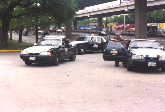 On the far left is a 1988 Texas Highway Patrol Mustang 
